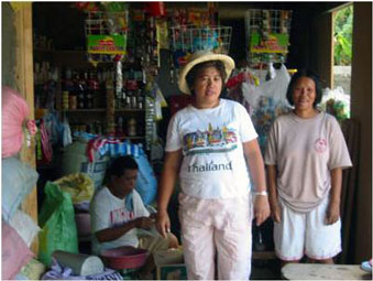 Elsa Belarmino in the store at the rice mill